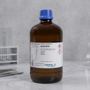 Front view of Kimyai chemical product dimidium bromide bottle on laboratory workspace with test tubes, flasks, and metal tools nearby